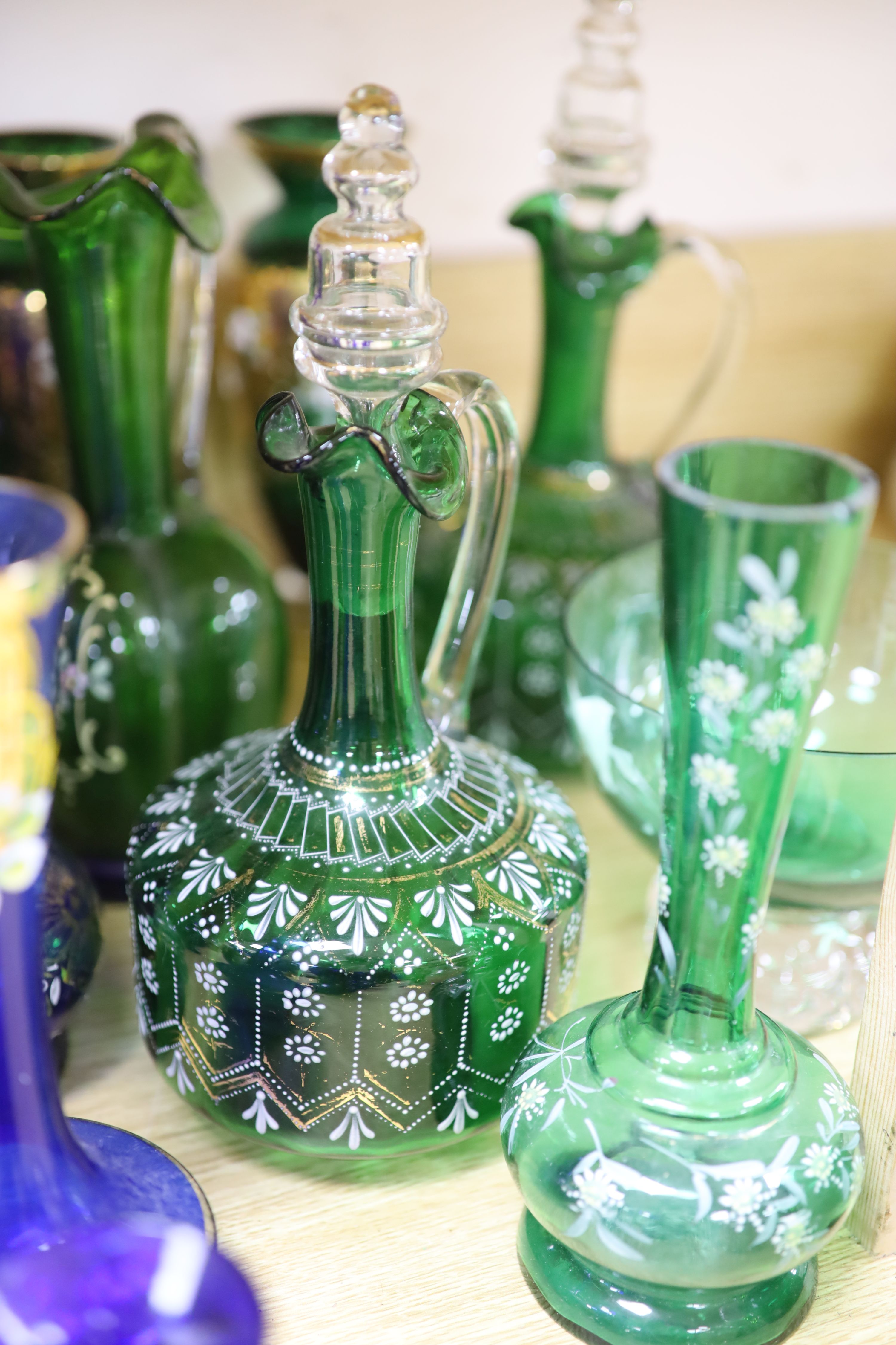 A collection of gilded blue and green glass, Bohemian and other glass